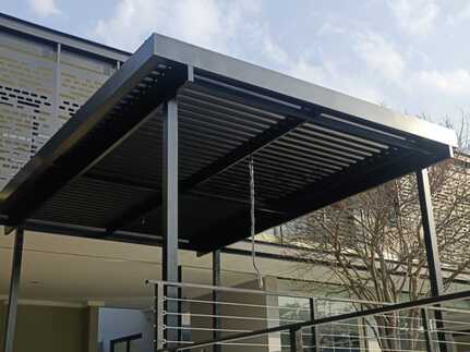 Motorised Bronze Adjustable Louvre with rain sensor